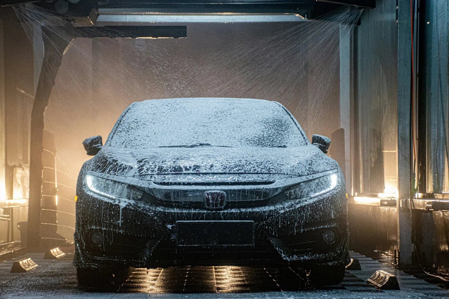 A premium car entering the Clean Wash tunnel